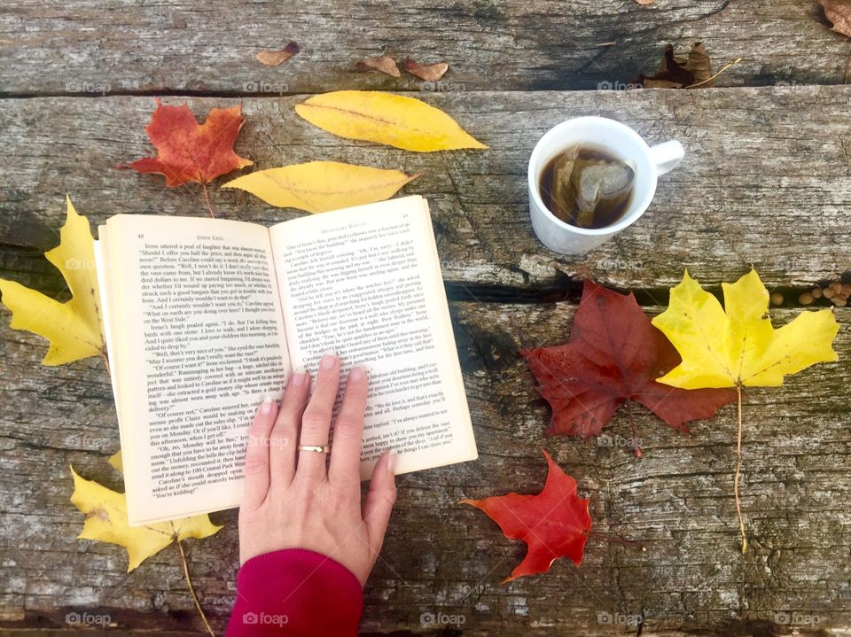 Cup of hot tea in autumn