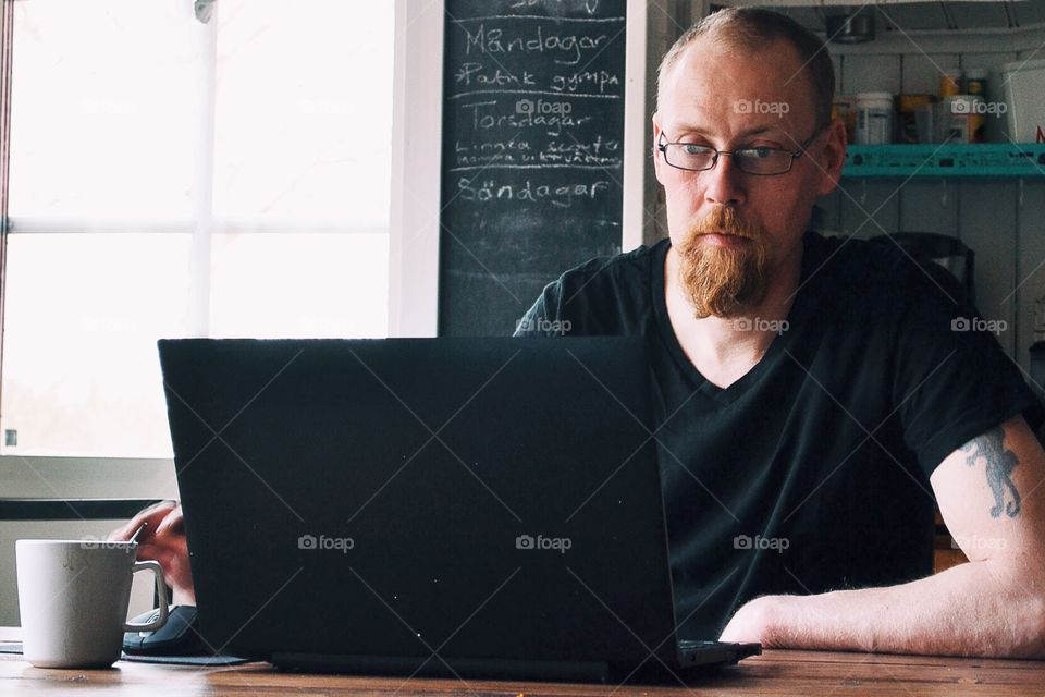 Man using his laptop