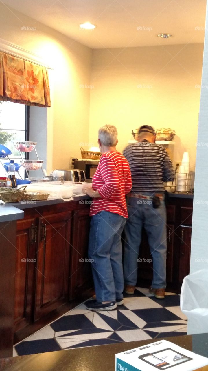 fixing breakfast in the hotel breakfast area