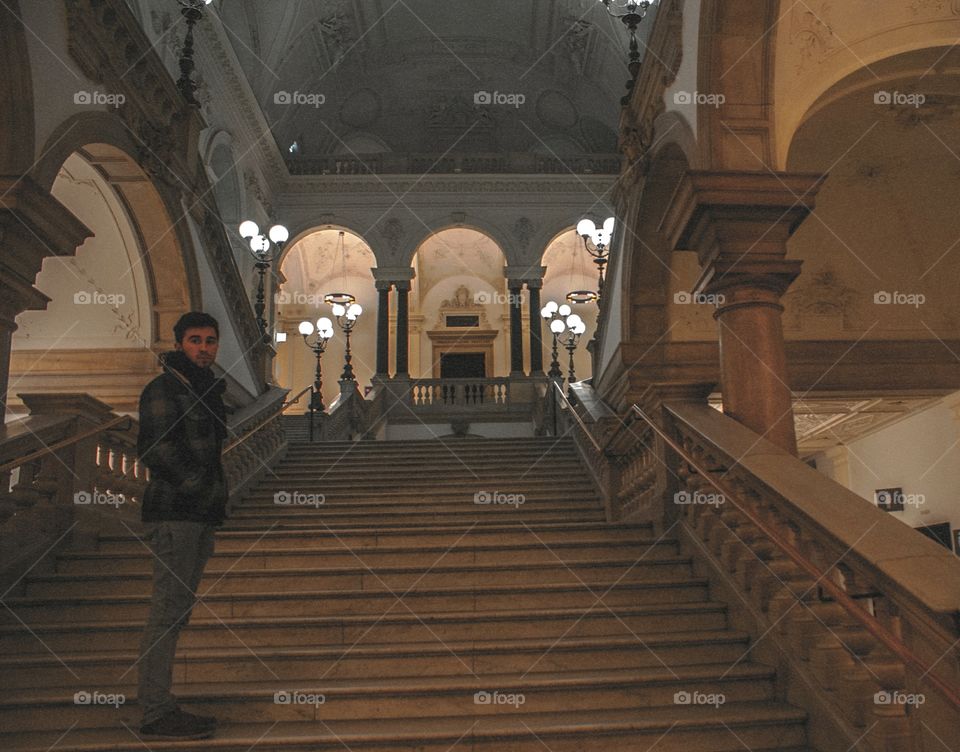 Man standing on staircase