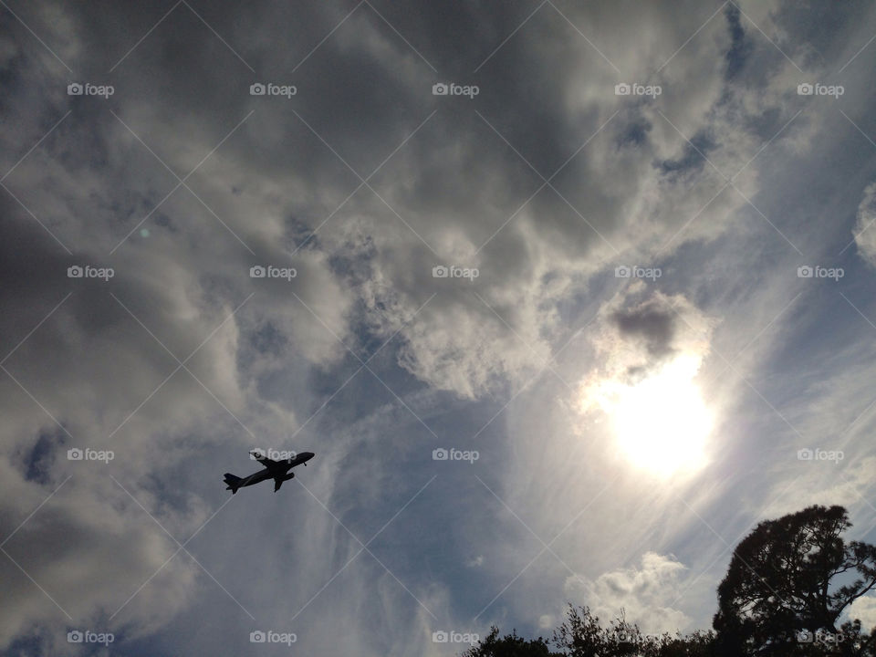 Jet in a cloudy sky.