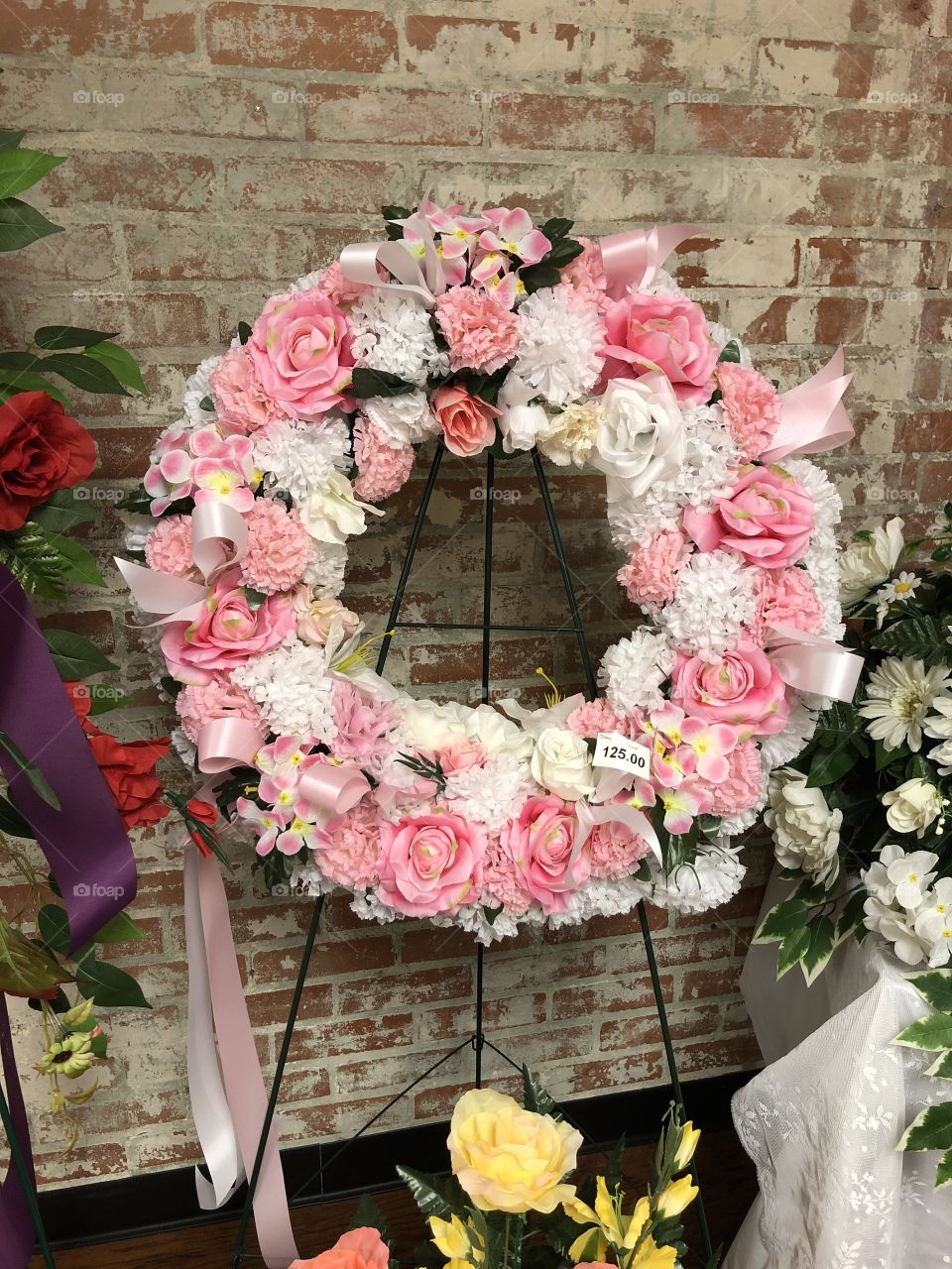 Pink and white funeral wreath 