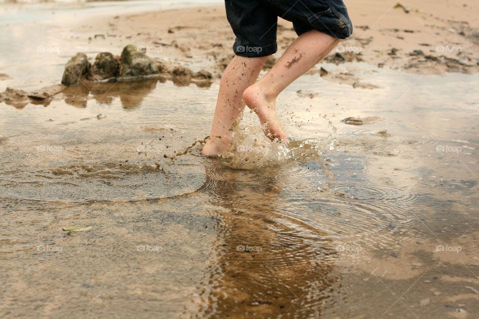 splashing in the puddles