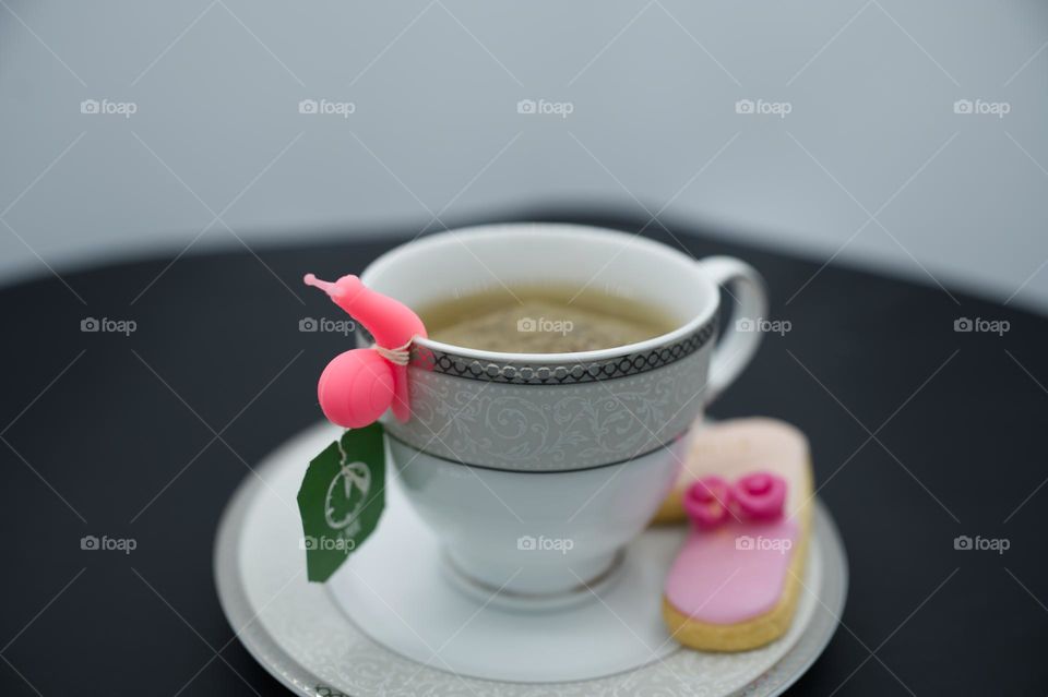 tea bag holder in the shape of a pink snail