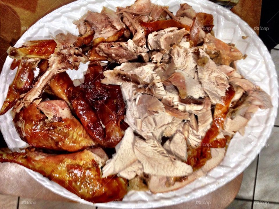 Cut roasted turkey on a tray