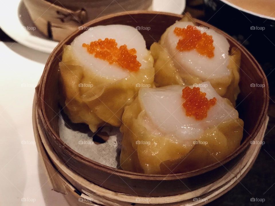 Chinese dim sum dinner dumplings inside bamboo steamer basket, Asian cuisine, Cantonese cuisine, Chinese cuisine 