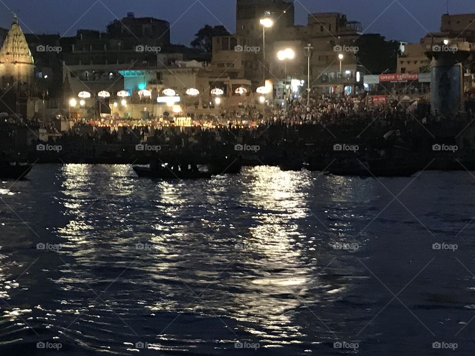 Evening spritual River Ganga reflacting city light