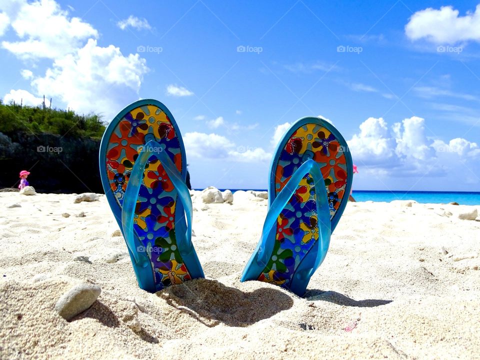 Flip flops in the sand