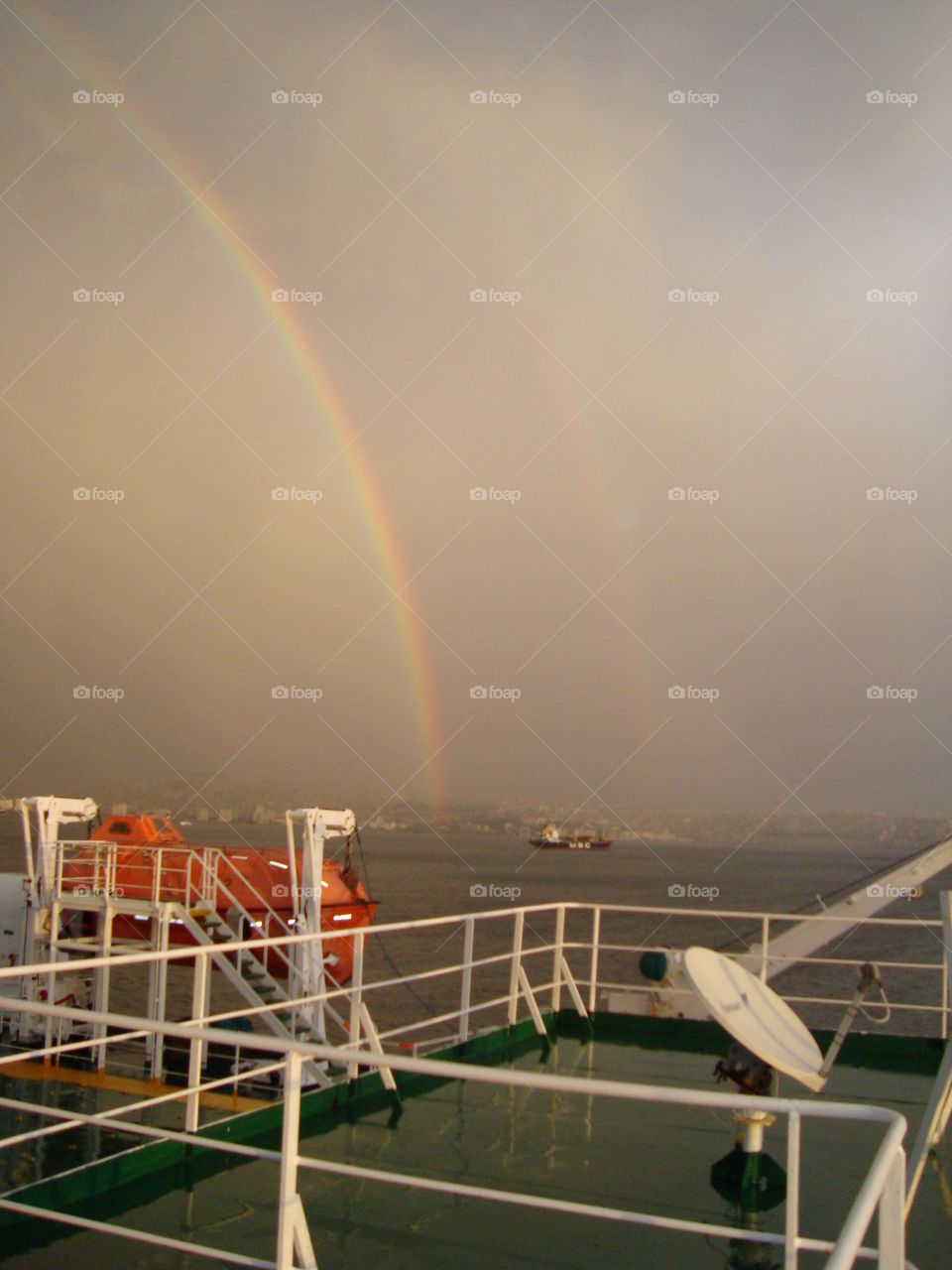 # Ship# Rainbow# Awesome# ship's weather deck# Grimaldi lines# Clear sky# seven colours#