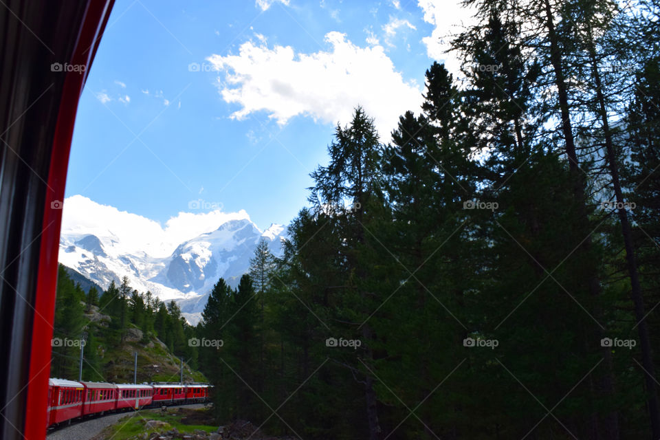 Traveling by train through Swiss Alps