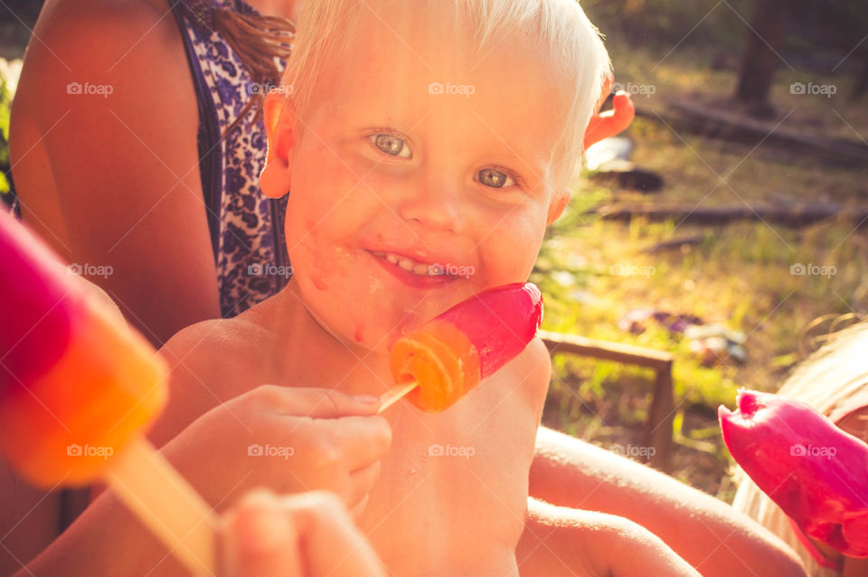 Little boy eating ice cream