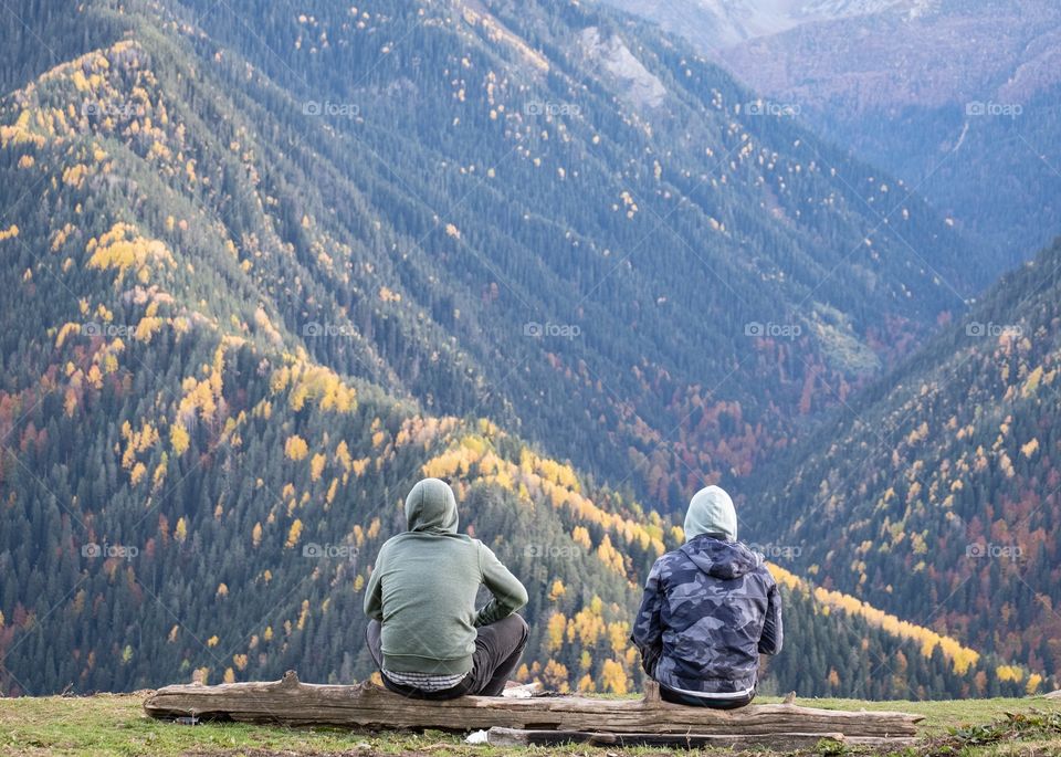 Space is not problem for us ... Nice scene of nice friend are sitting to talk together and see the beautiful colorful Autumn view in Georgia , new landmark for tourists around the world