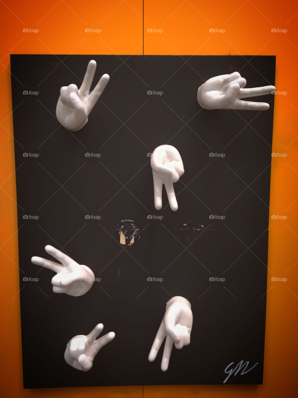 Composition from human hands in the form of a gesture: "victory"