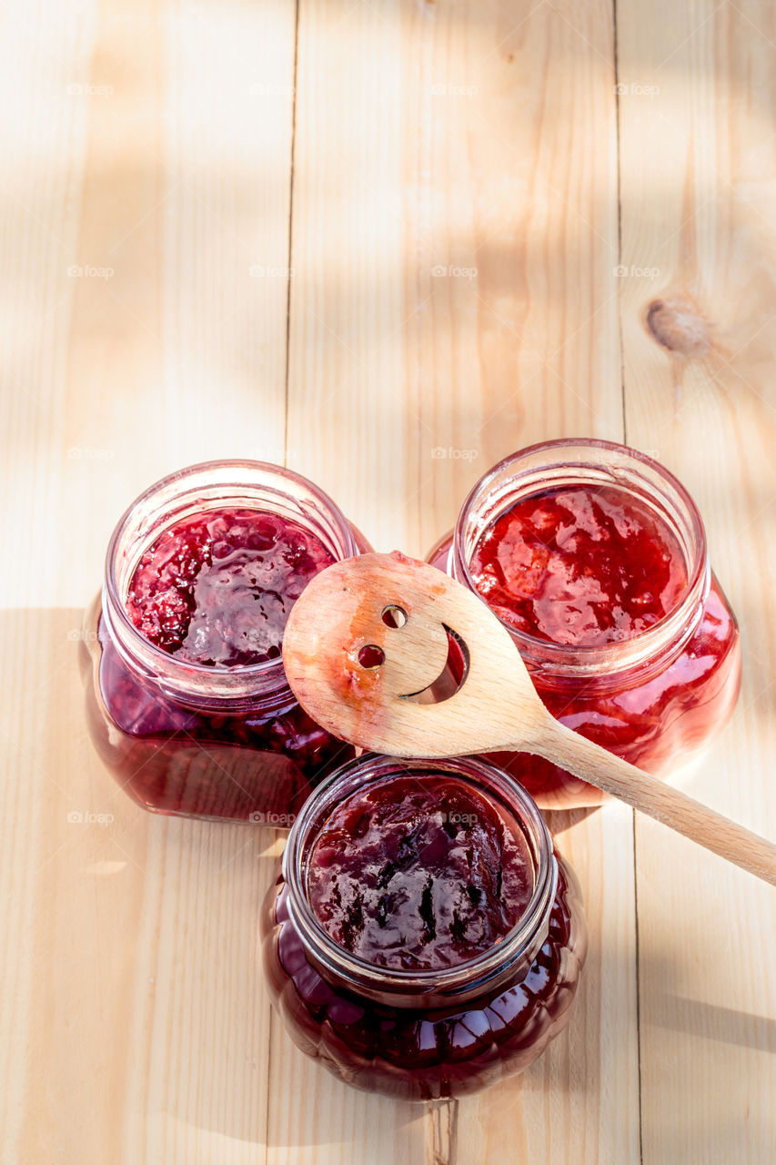 Homemade jam on wooden table. Homemade jam on wooden table