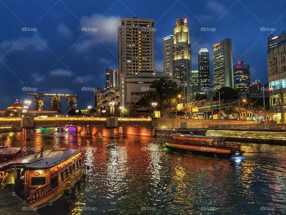 colorful view of Singapore  Marina Bay sands by night from Clarke quay