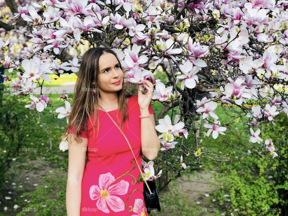 Woman and magnolias