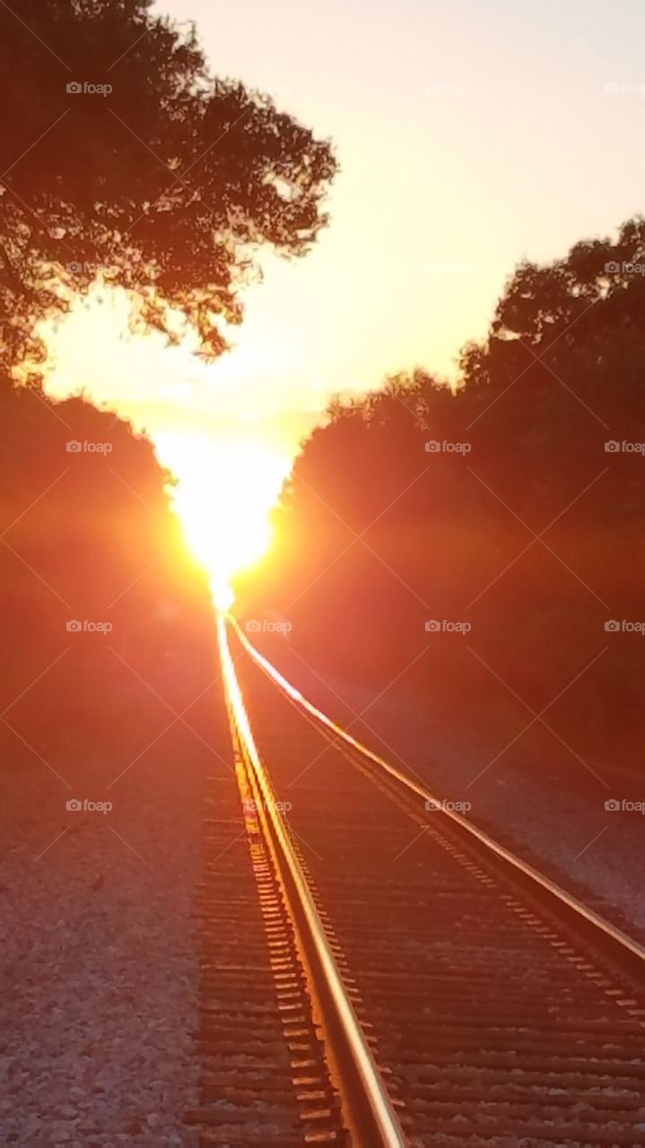 Sunset on the railroad tracks