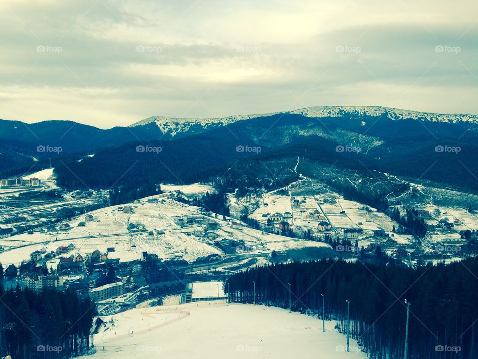 Evening in the mountains in winter, Ukraine Bukovel