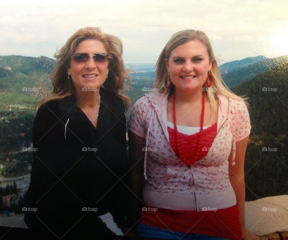 Mother and Daughter . Mother and Daughter on top of a mountain 