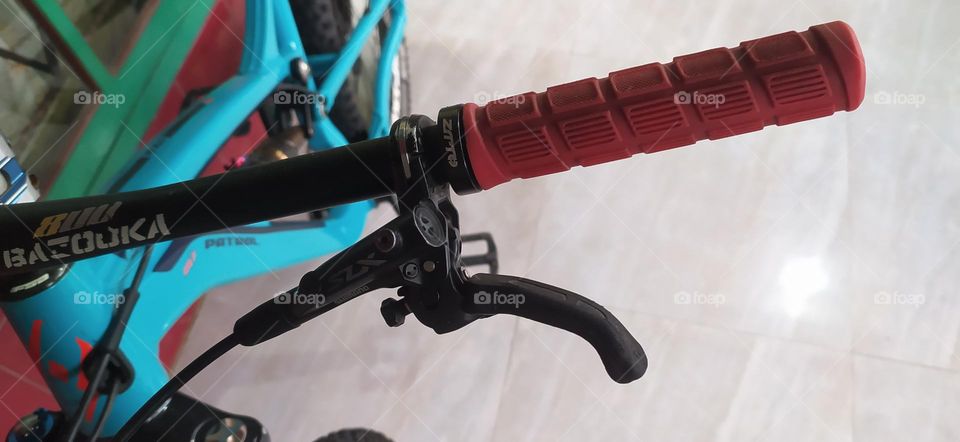 Left hand grip and bicycle brake.