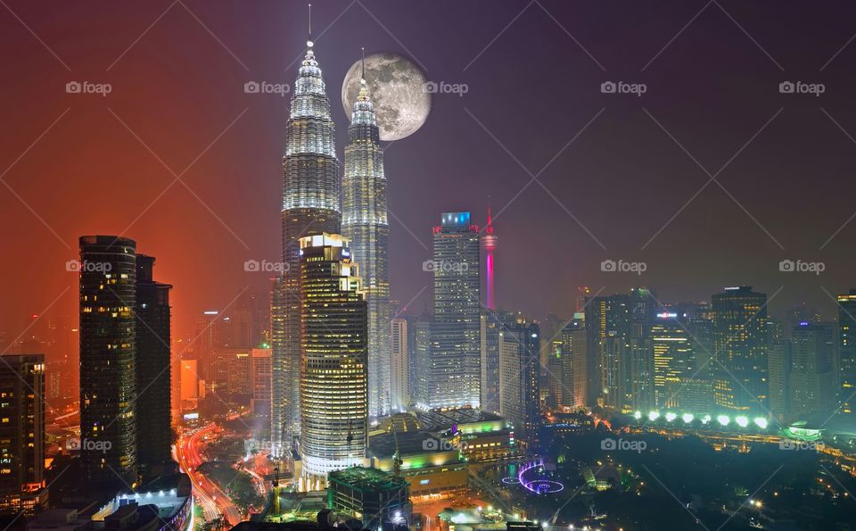 Super moon rise over Kuala Lumpur city