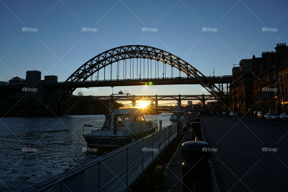 Under The Tyne Bridge Sunset ... rays hitting a small boat 