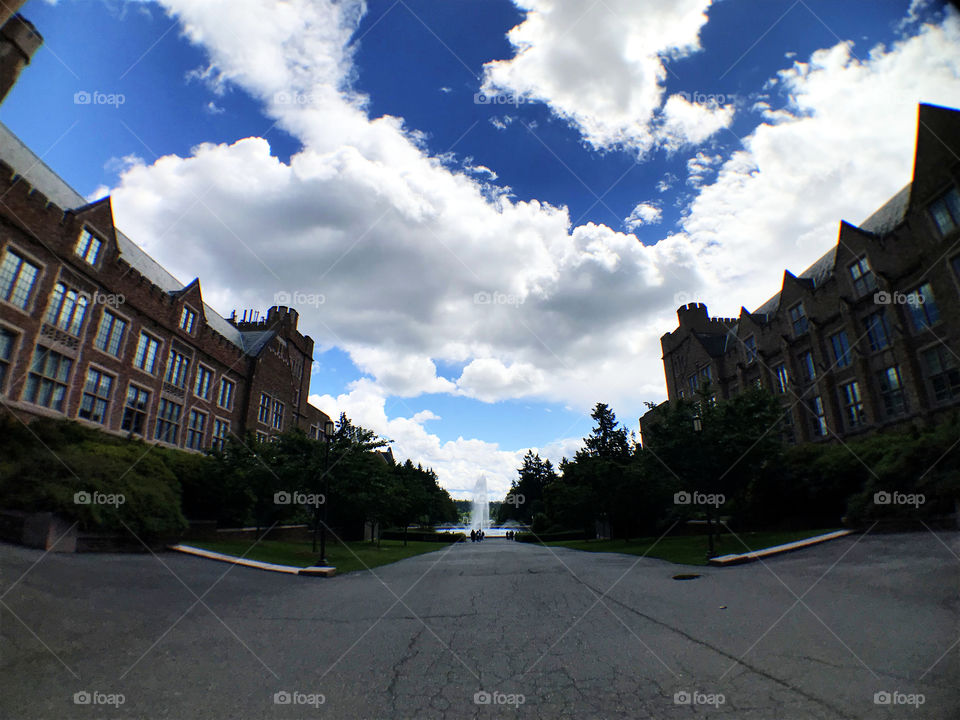 Simple perspective but feels spectacular with big mass of sky color and narrow approach to the fountain.