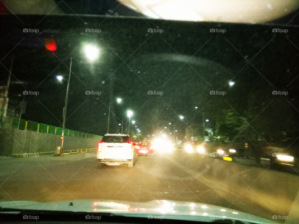 vehicles , driving ,night ,road ,lights ,white vehicle , Allahabad ,dwan ,evening ,going to park ,