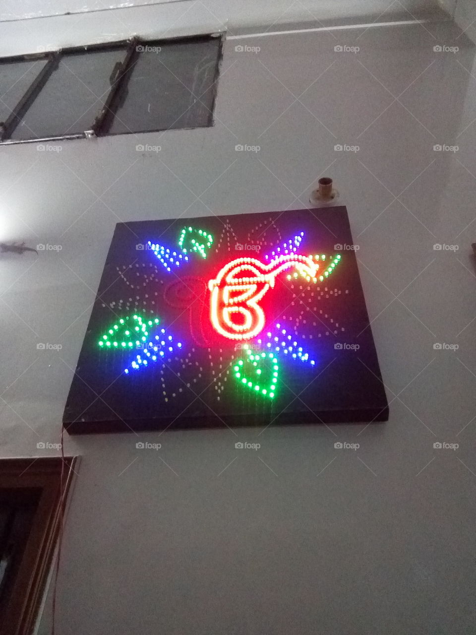A Sign of Shree Vaheguru Ji (God) in Sikhism made of beautiful blinking lights