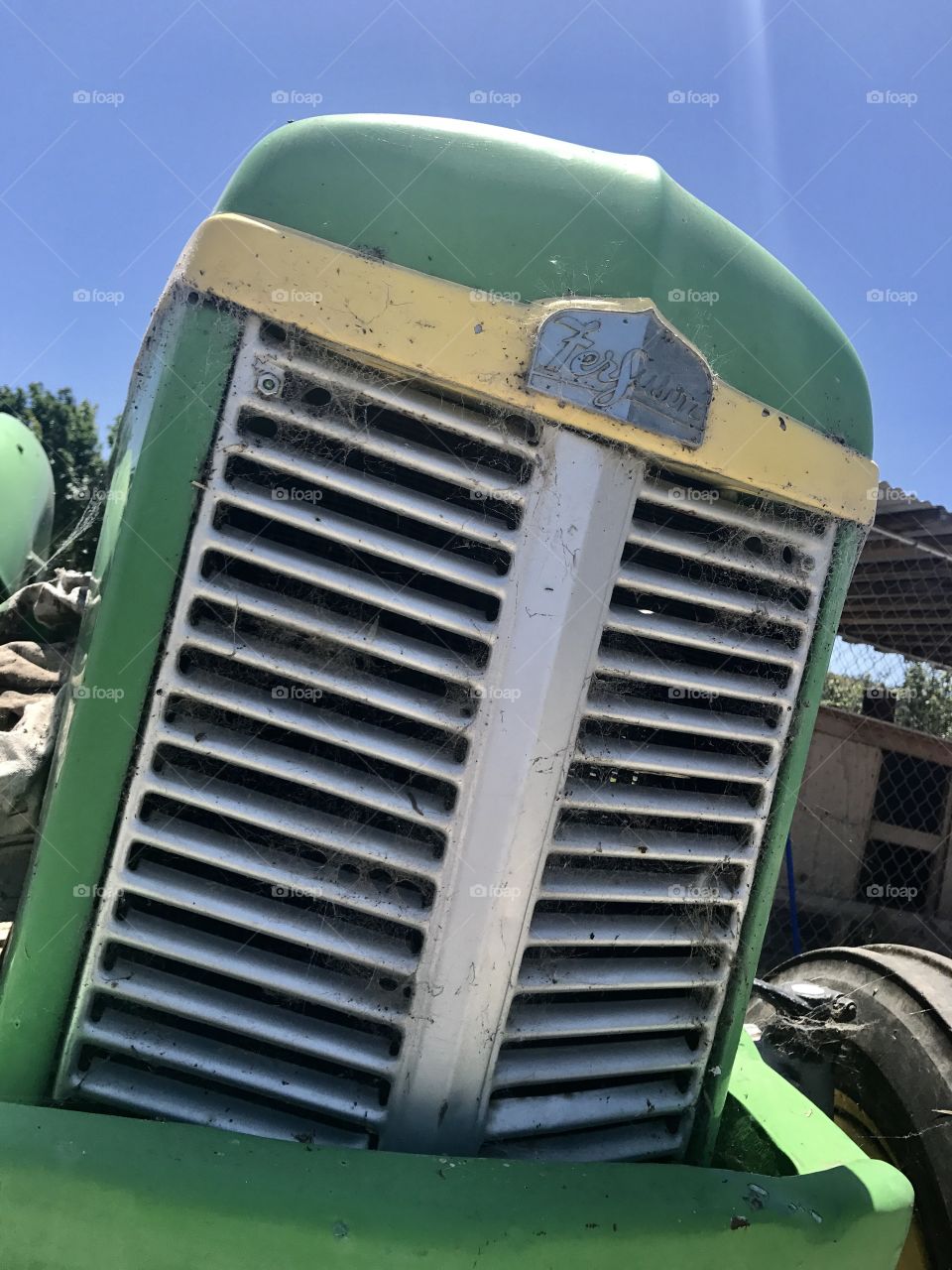 Green tractor grill