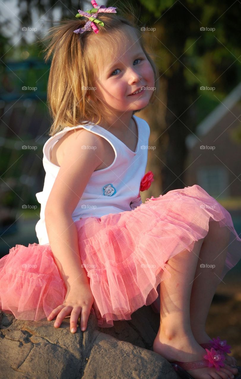 Happy girl. She was so proud of herself for climbing to the top of the rock! 