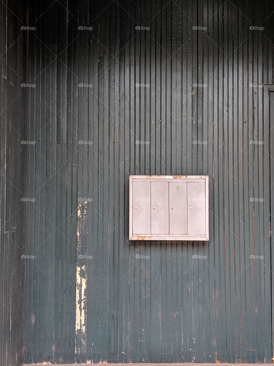 Vintage mailboxes on a wall