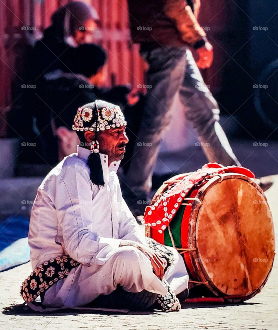 djmaa el fna and the central Square are usually full of tourists and artisans. However as this lone artist contemplates the current crisis, just wonder what he is thinking - should I work in a shop???