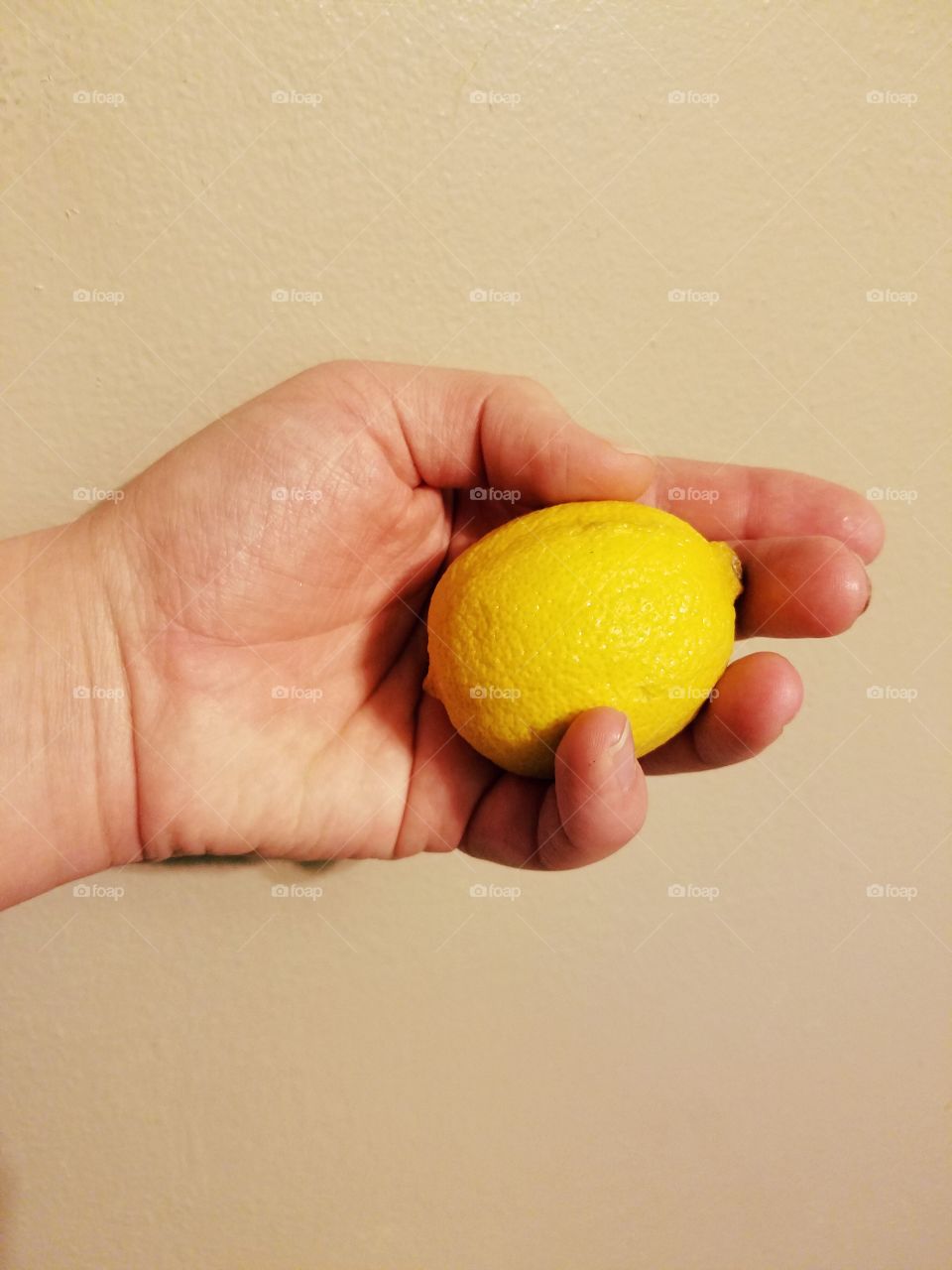 lemon in hand