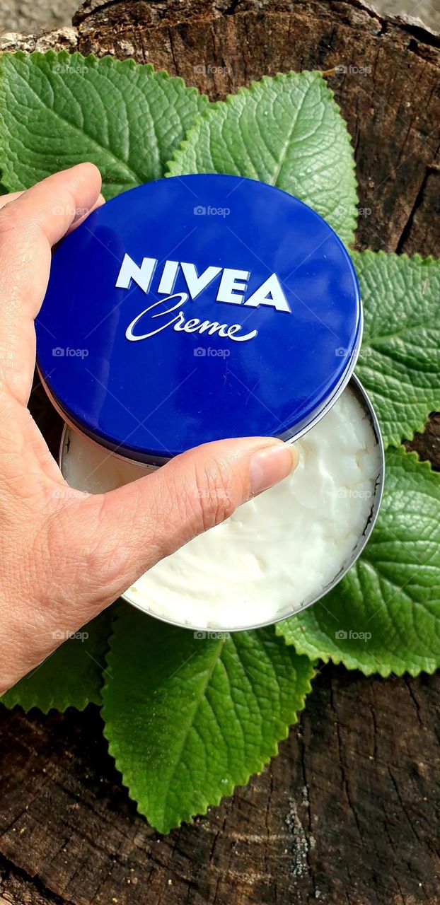 round, circular container of Nivea cream