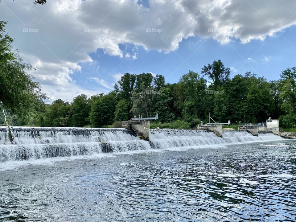 waterfall trees and clouds