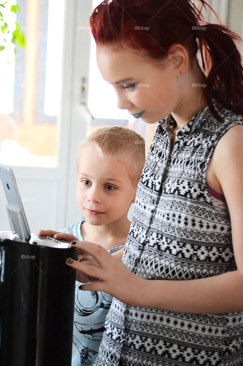 Children listening ho music