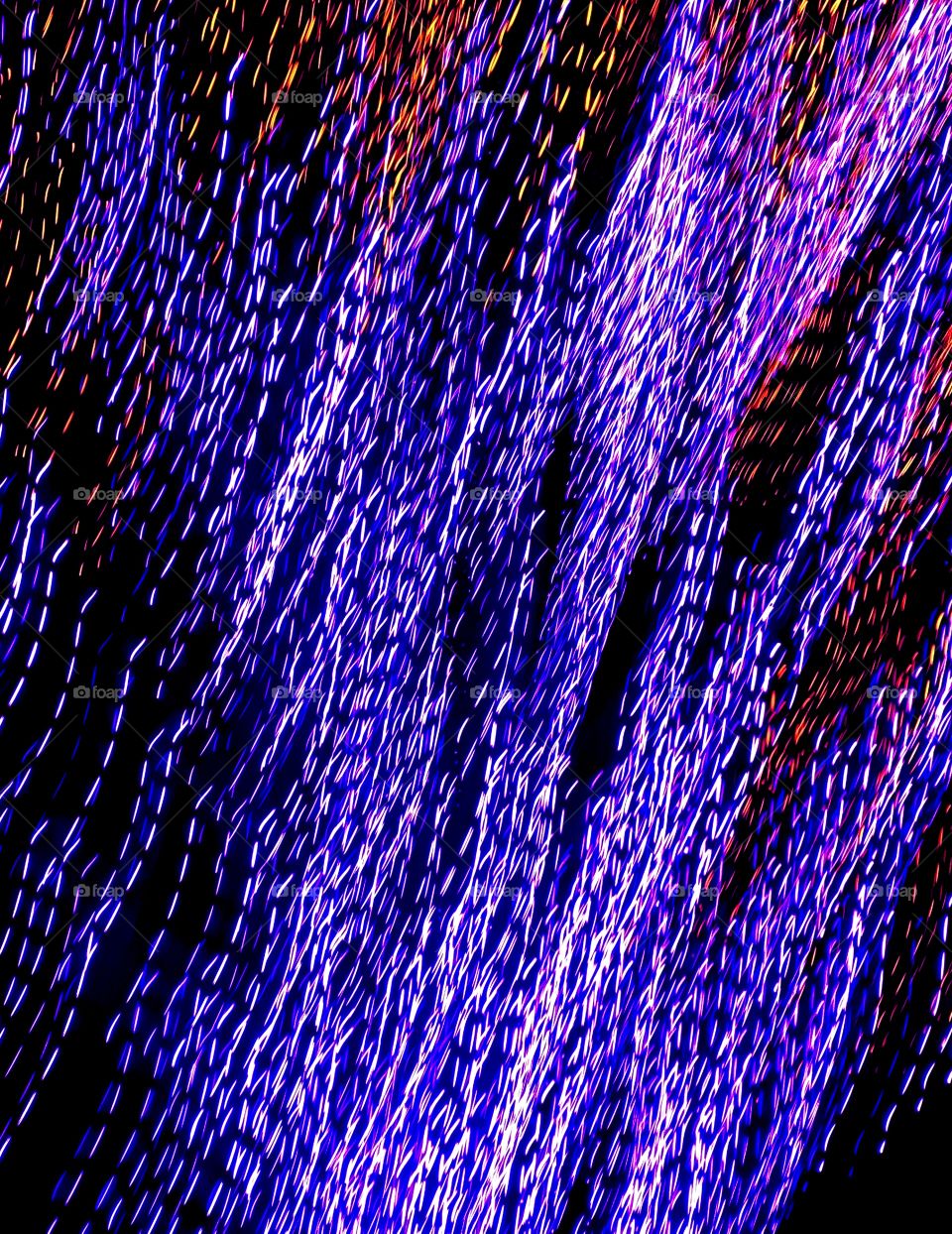 Image taken with a fast-moving camera; purple and red string lights—taken in Chicago, Illinois 