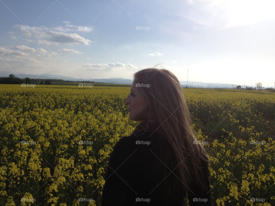A portrait of a girl in the field