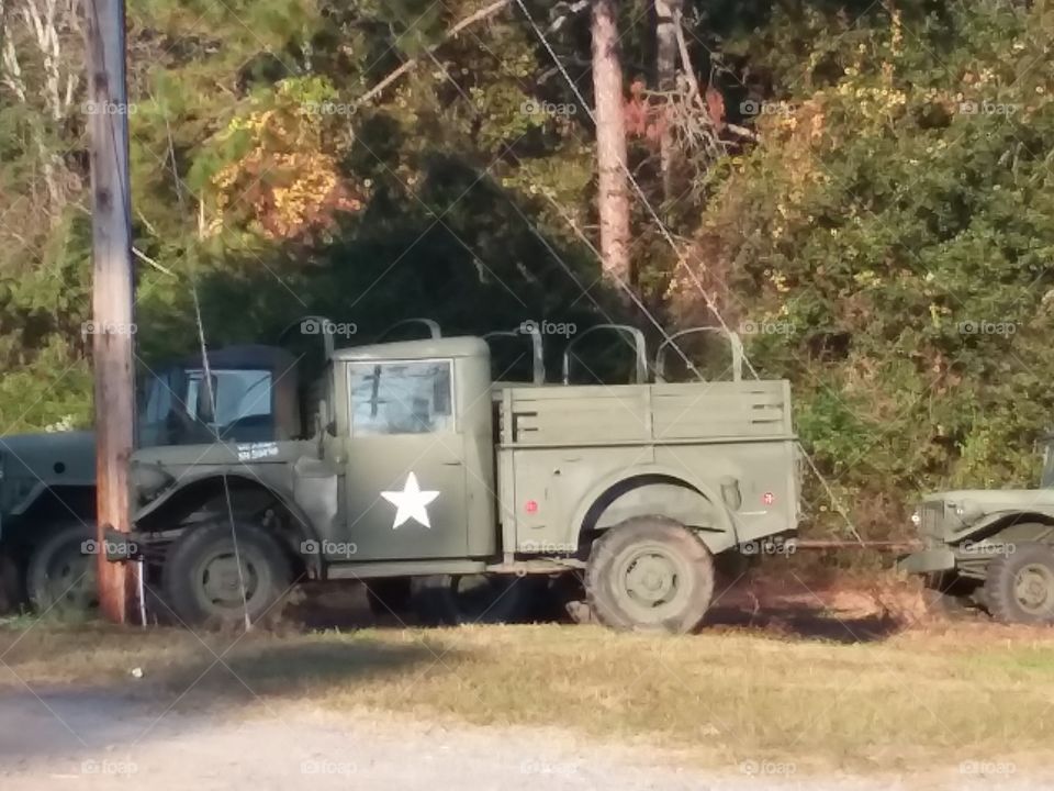 Closeup view of old military trucks