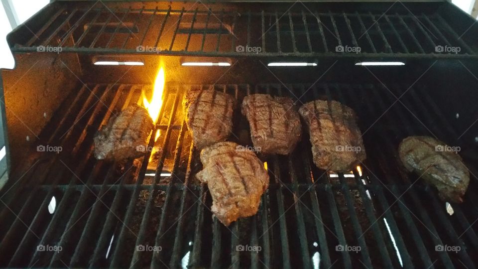 steaks on the grill