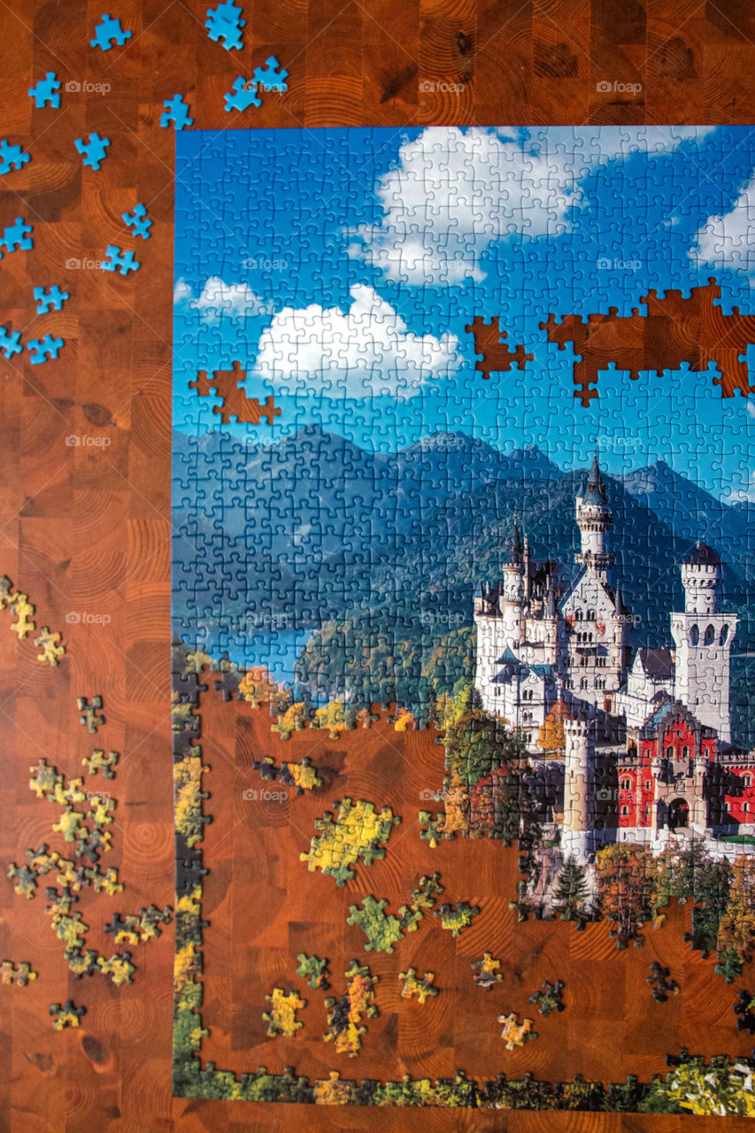 View of neuschwanstein castle with puzzle