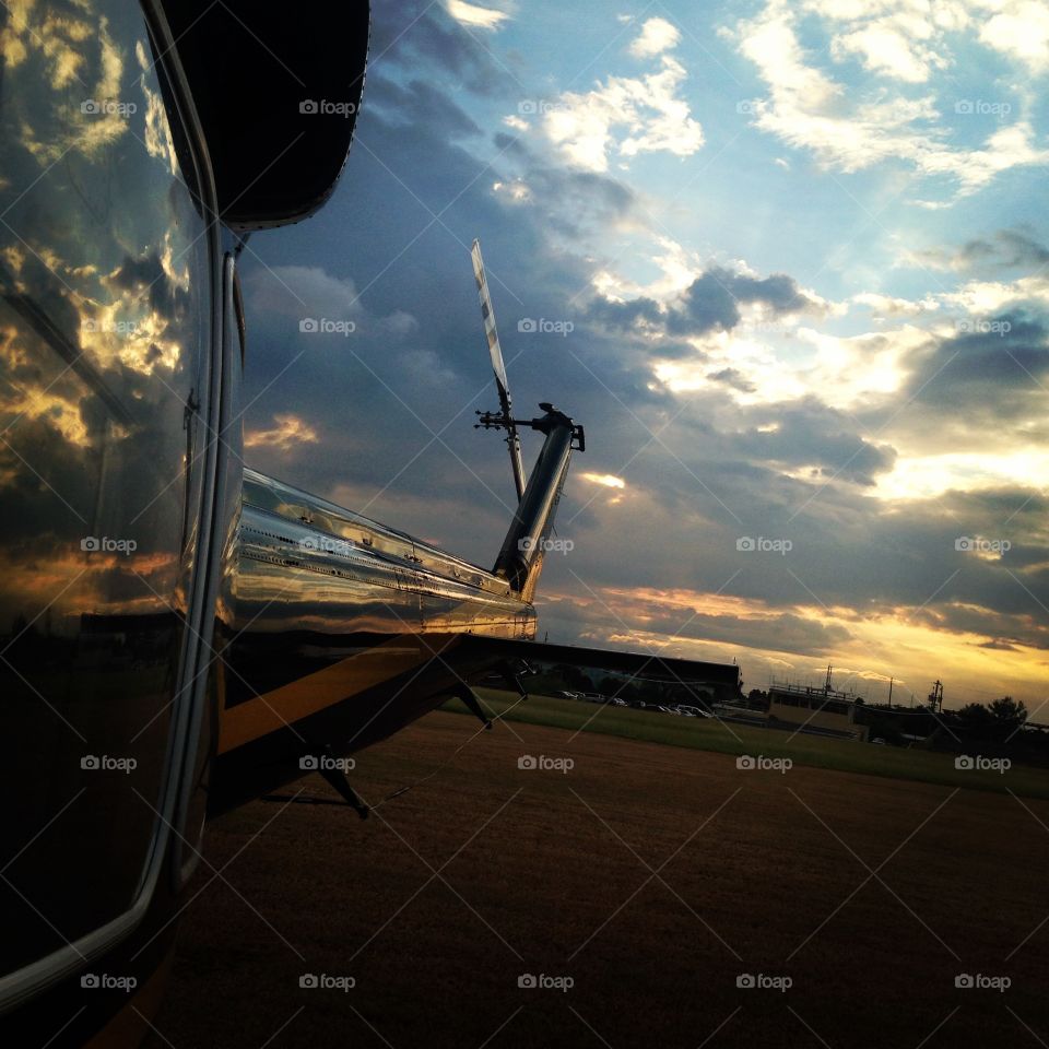 Rear view of a Bell 412 Helicopter looking towards the Sunset in Kingston Jamaica. 