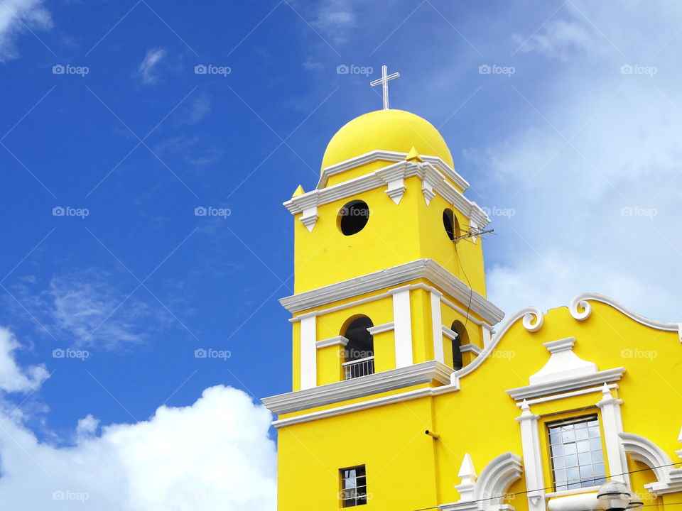 Bright colored church blue sky ayabaca peru