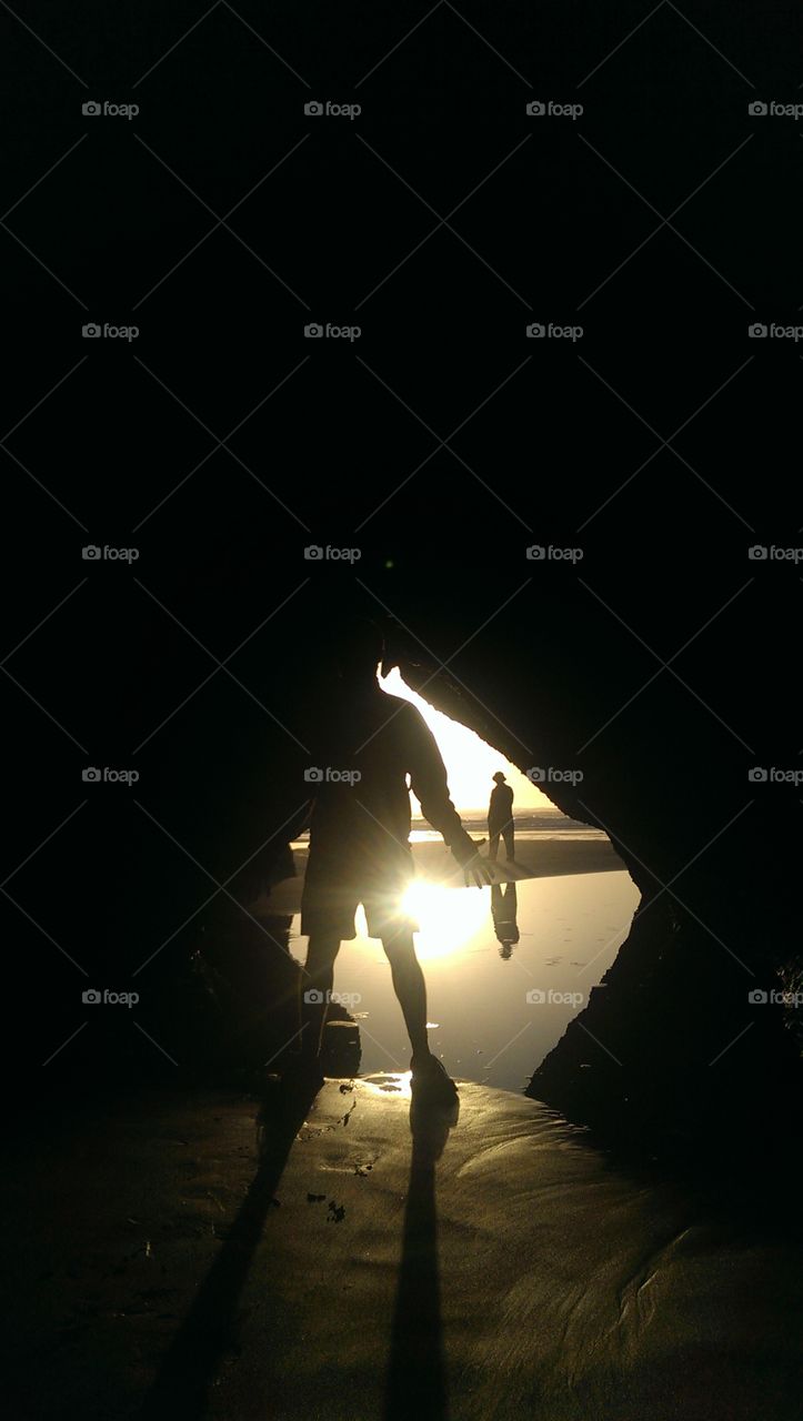 In the cave with my friends. we went to the most amazing beach in the southisland