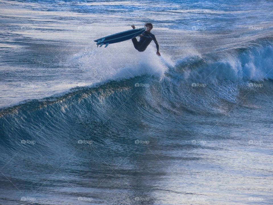 Surfer doing tricks