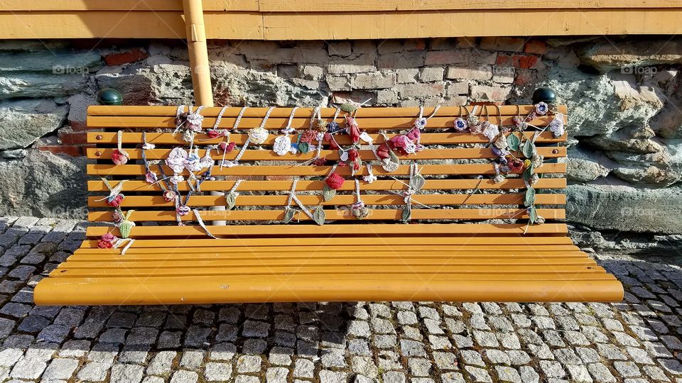 Colorful strips tied on the bench