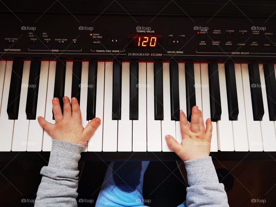 Little Mozart plays piano