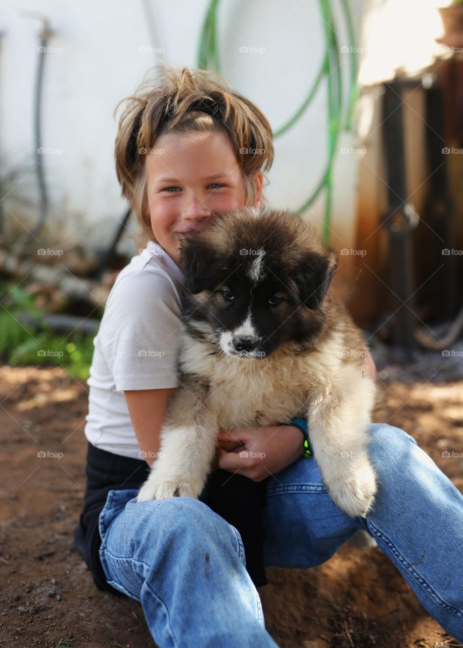 walking the dog, people walking the dogs on the street, they spend time together, the person plays with the dog, trains it, eat delicious food, take pictures. best friends are dogs. children and dogs for a walk