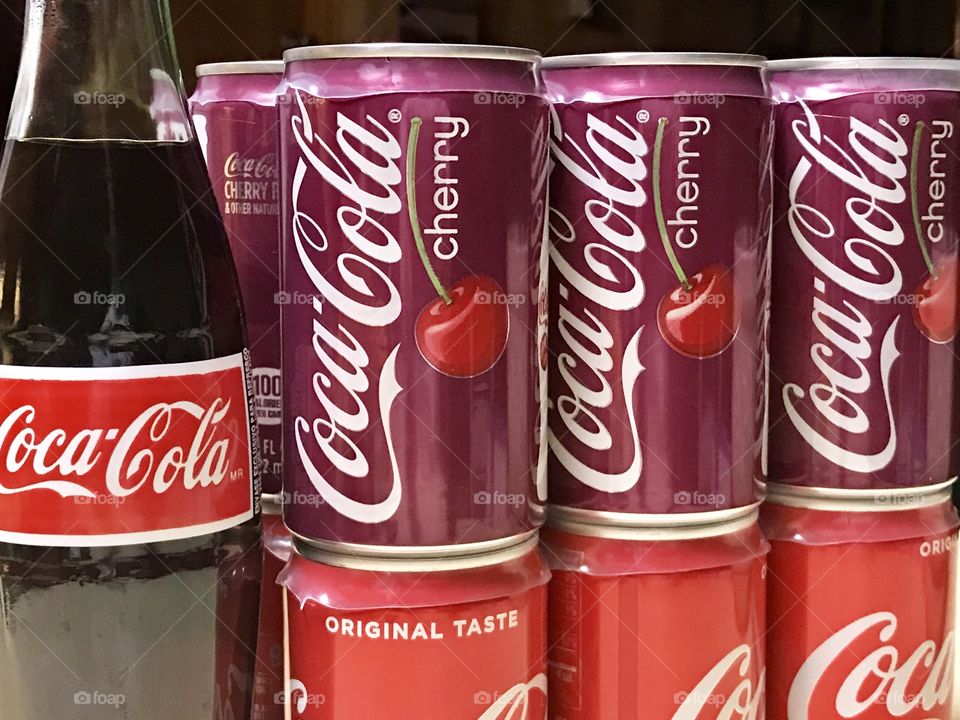 Coca Cola and cherry coke cans and bottle 
